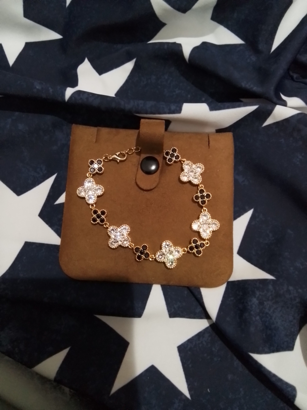 Gold-tone Clover Link Bracelet with Black and Clear Accents